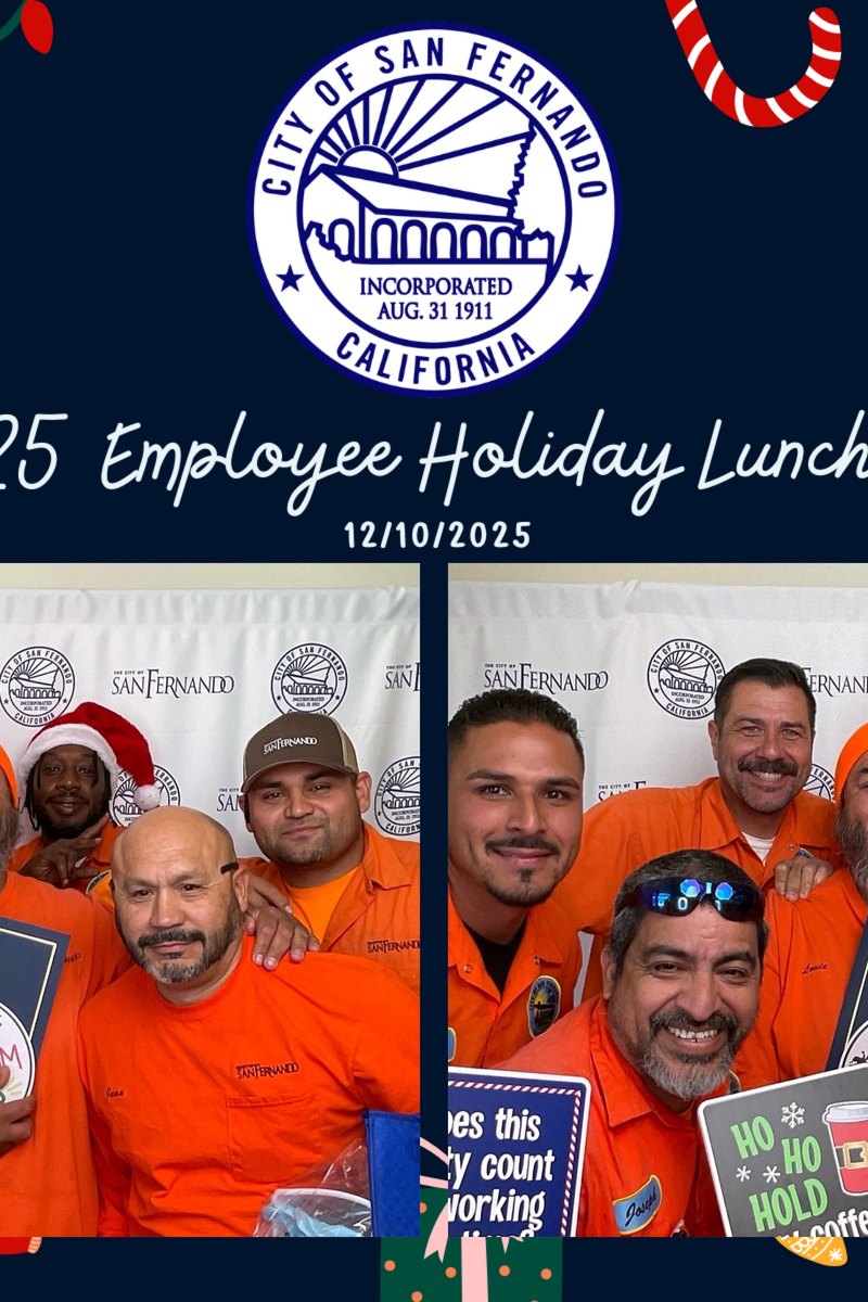 Employees celebrating at a company holiday photo booth