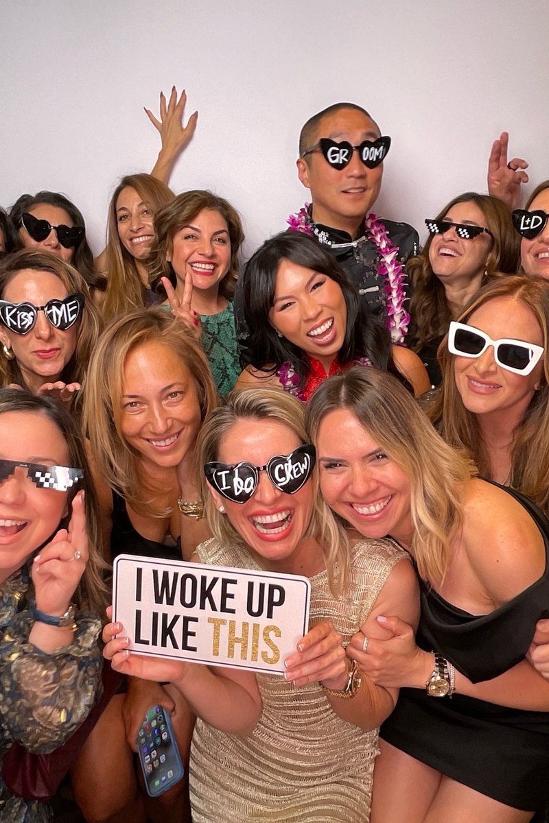 Guests enjoying a PBLA Booth photo session at an event